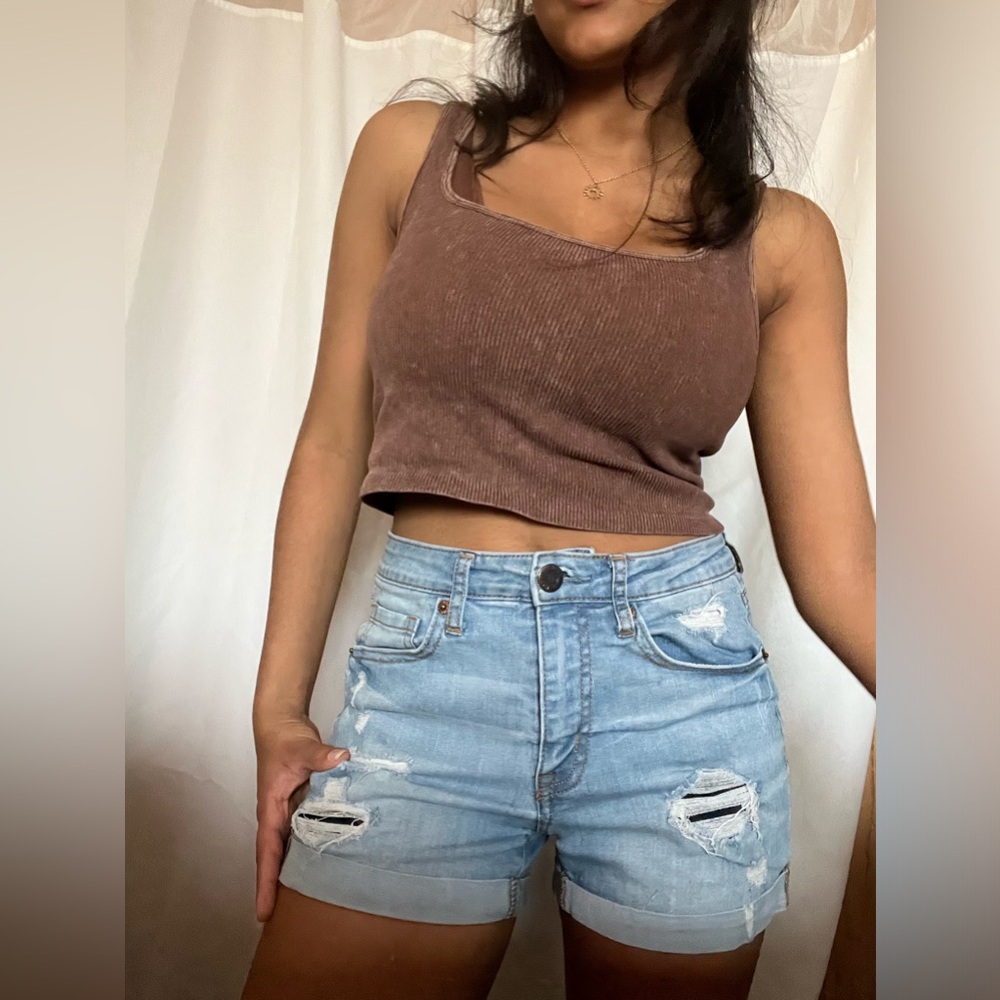 Blue ripped shorts. So soft and comfy I can wear them all day. Size 4.